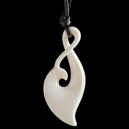 Rebirth Twist Koru, hand crafted bone pendant