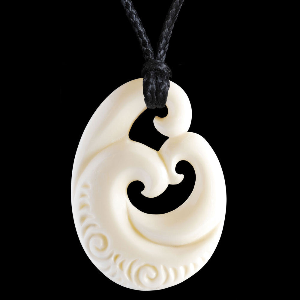 Family Koru with carved patterning, hand crafted bone pendant