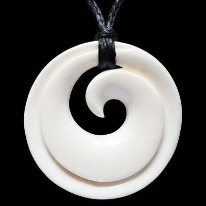 Closed Circle Koru, hand carved bone pendant
