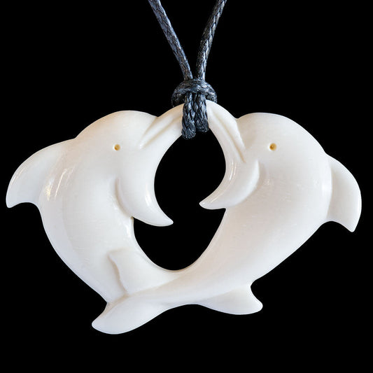 Playing Dolphins, hand-crafted bone pendant