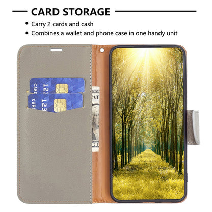 For iPhone 15 Plus Wallet Case with Wrist Strap Litchi Texture Leather Phone Stand Cover