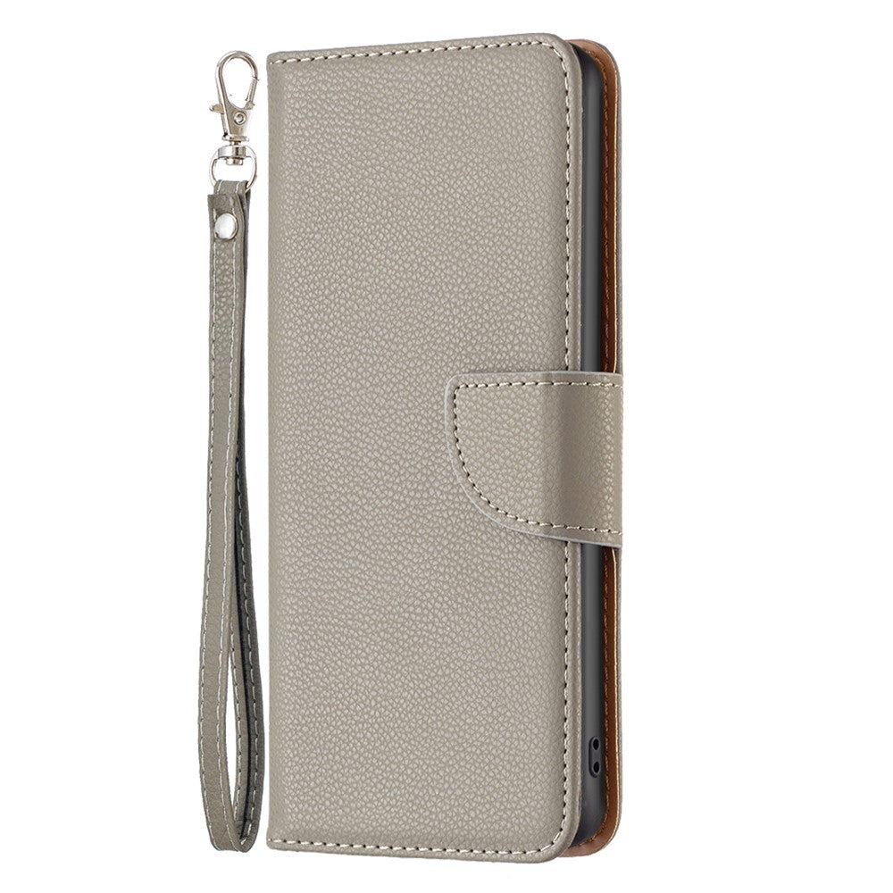 For iPhone 15 Plus Wallet Case with Wrist Strap Litchi Texture Leather Phone Stand Cover