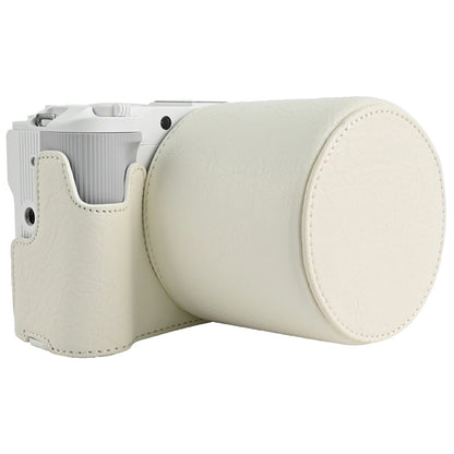 For Canon EOS R50 V Camera Half Case Litchi Texture Battery Opening PU Leather Cover with Shoulder Strap and Lens Cap