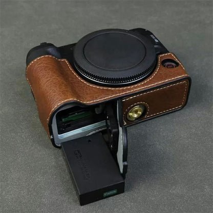 For Canon EOS R50 V Buffalo Texture PU Leather Bottom Case Half Body Camera Cover with Battery Opening