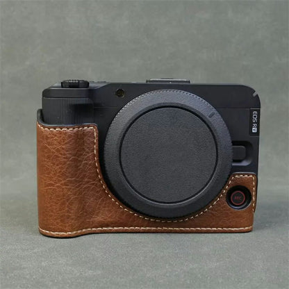 For Canon EOS R50 V Buffalo Texture PU Leather Bottom Case Half Body Camera Cover with Battery Opening