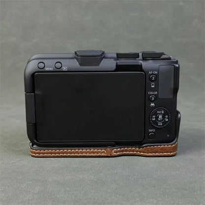 For Canon EOS R50 V Buffalo Texture PU Leather Bottom Case Half Body Camera Cover with Battery Opening