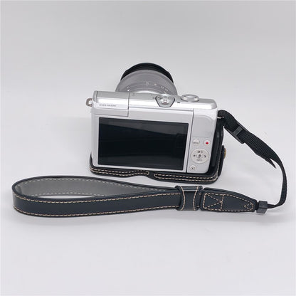 Camera Case for Canon EOS M10  /  M100  /  M200 Faux Leather Half Case with Hand Strap Removable Battery Access Base Cover