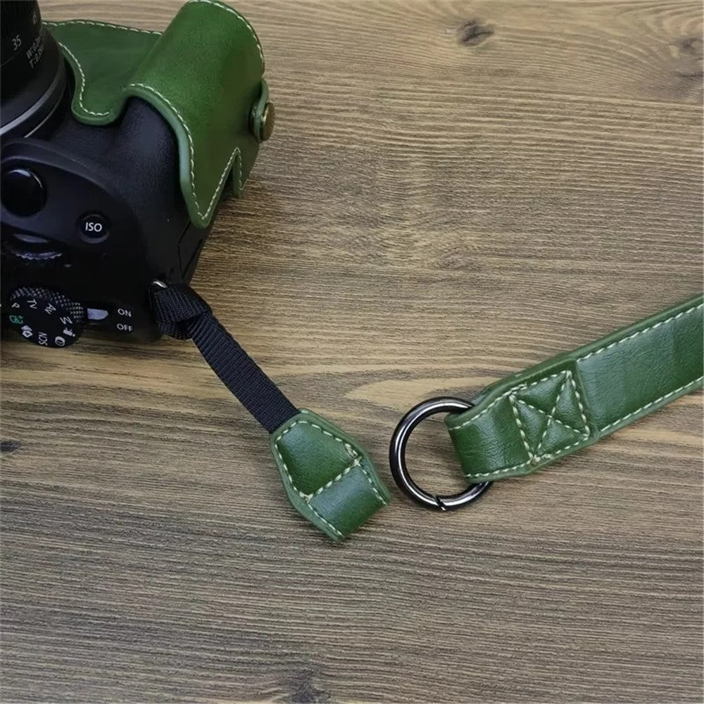 For Canon EOS R50 / R100 PU Leather Camera Case Battery Opening Design Camera Cover with Strap and Small Bag