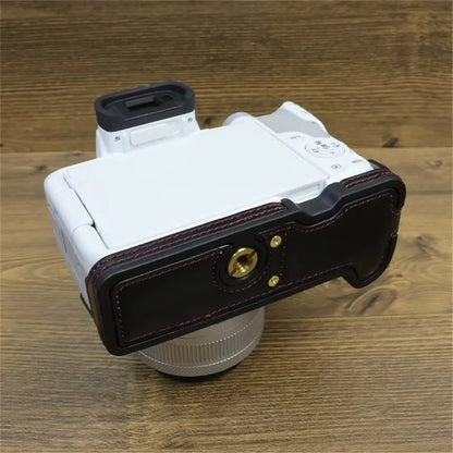 For Canon EOS R50 / R100 PU Leather Bottom Case Half Body Camera Cover with Wrist Strap