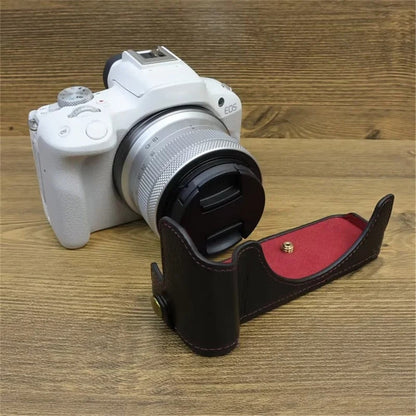 For Canon EOS R50 / R100 Genuine Cow Leather Camera Bottom Case Anti-drop Cover with Wrist Strap