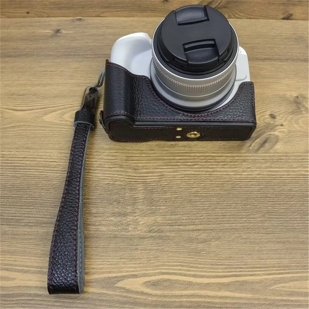 For Canon EOS R50 / R100 Genuine Cow Leather Camera Bottom Case Anti-drop Cover with Wrist Strap
