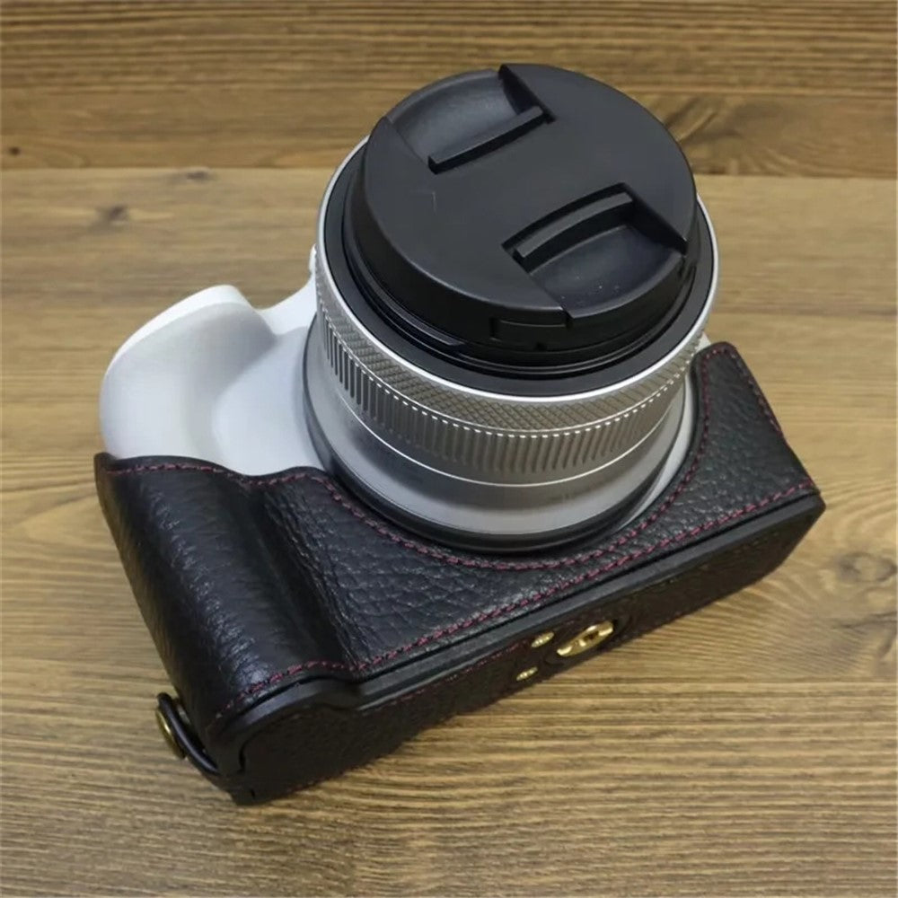 For Canon EOS R50 / R100 Genuine Cow Leather Camera Bottom Case Anti-drop Cover with Wrist Strap