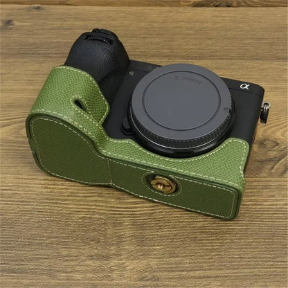 For Sony A6700 Dustproof PU Leather Camera Bottom Cover Half Body Case with Wrist Strap