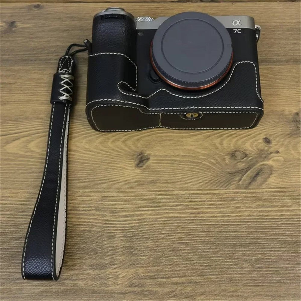 For Sony A7C II / A7CR Camera Bottom Case PU Leather Anti-Drop Half Body Cover with Wrist Strap