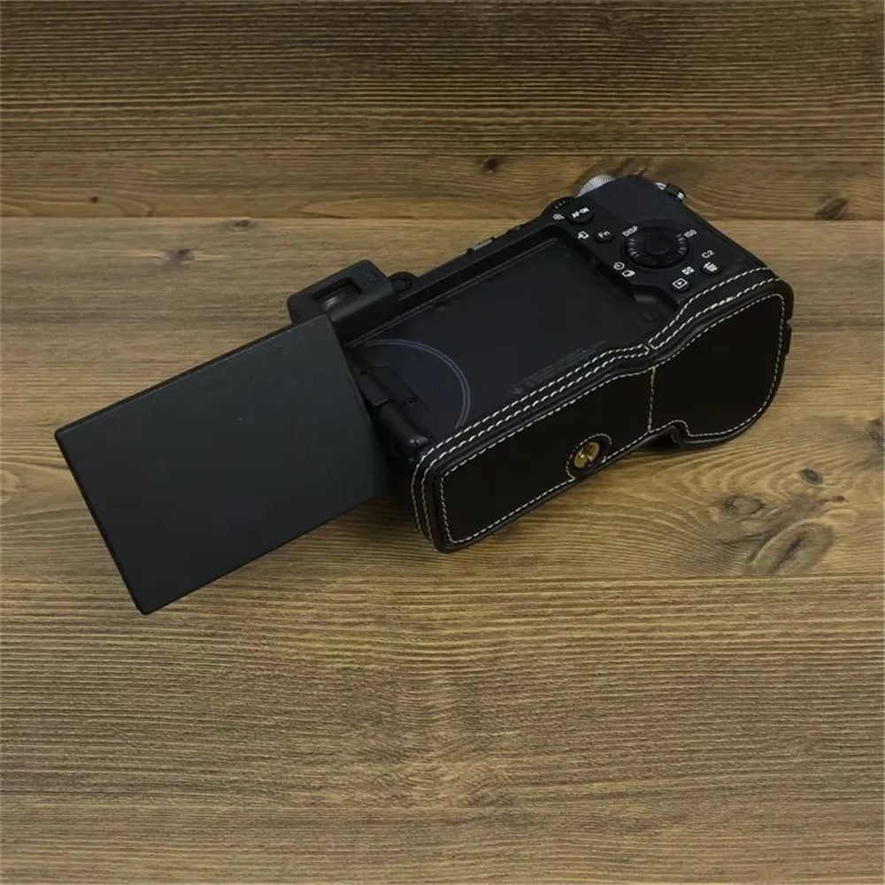 For Sony A7C II / A7CR Camera Bottom Case PU Leather Anti-Drop Half Body Cover with Wrist Strap