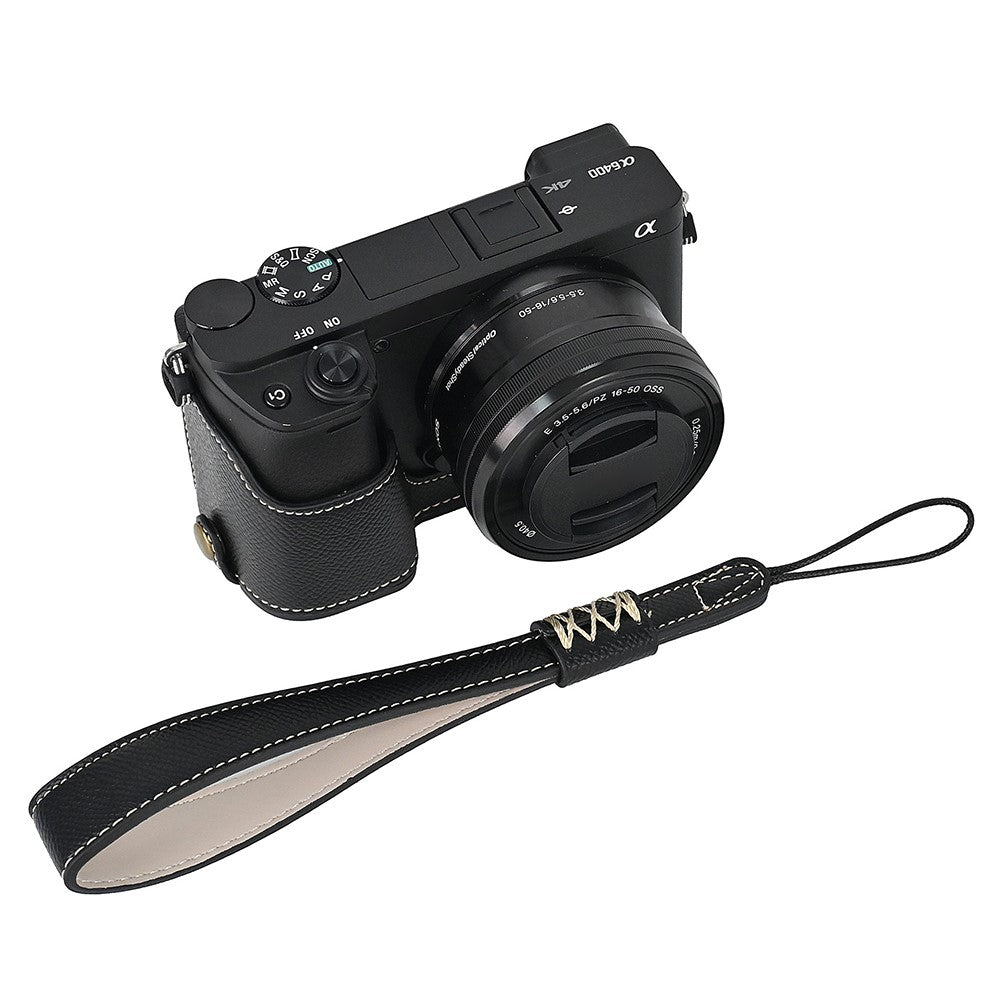 Camera Case for Sony A6400 / A6300 / A6100 / A6000 Battery Opening Design Palm Texture PU Leather Half Body Bottom Case with Wrist Strap