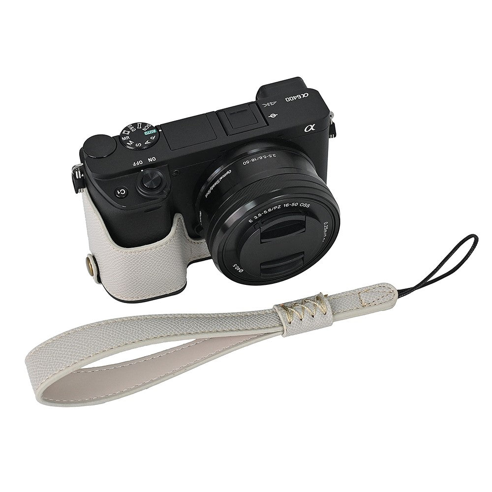 Camera Case for Sony A6400 / A6300 / A6100 / A6000 Battery Opening Design Palm Texture PU Leather Half Body Bottom Case with Wrist Strap
