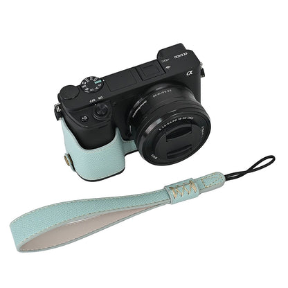 Camera Case for Sony A6400 / A6300 / A6100 / A6000 Battery Opening Design Palm Texture PU Leather Half Body Bottom Case with Wrist Strap