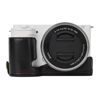 For Sony ZV-E10 Battery Opening Design PU Leather Camera Cover Half Body Bottom Case with Wrist Strap