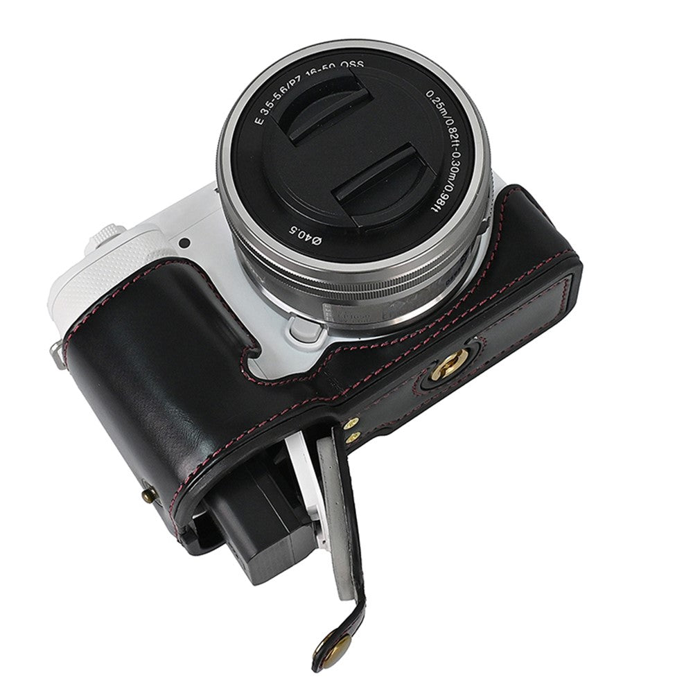 For Sony ZV-E10 Battery Opening Design PU Leather Camera Cover Half Body Bottom Case with Wrist Strap