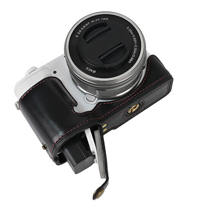For Sony ZV-E10 Battery Opening Design PU Leather Camera Cover Half Body Bottom Case with Wrist Strap