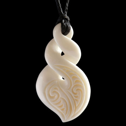 Fully Engraved Double Twist, handcrafted bone pendant