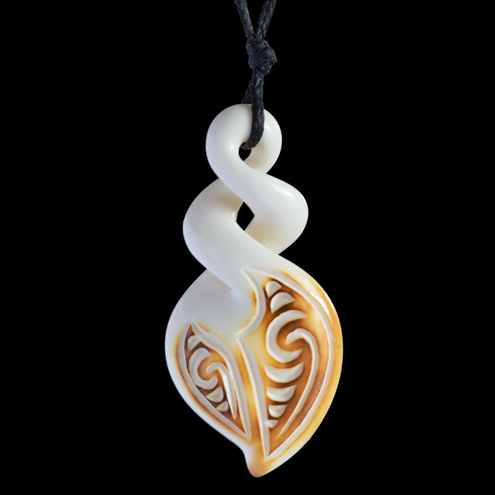 Flame Brushed Engraved Twist, handcrafted bone pendant