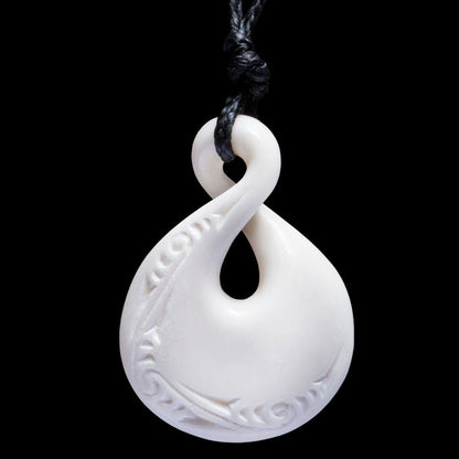 Small Engraved Twist, handcrafted bone pendant