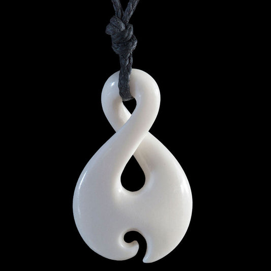 Small Twist Koru, hand-crafted bone pendant