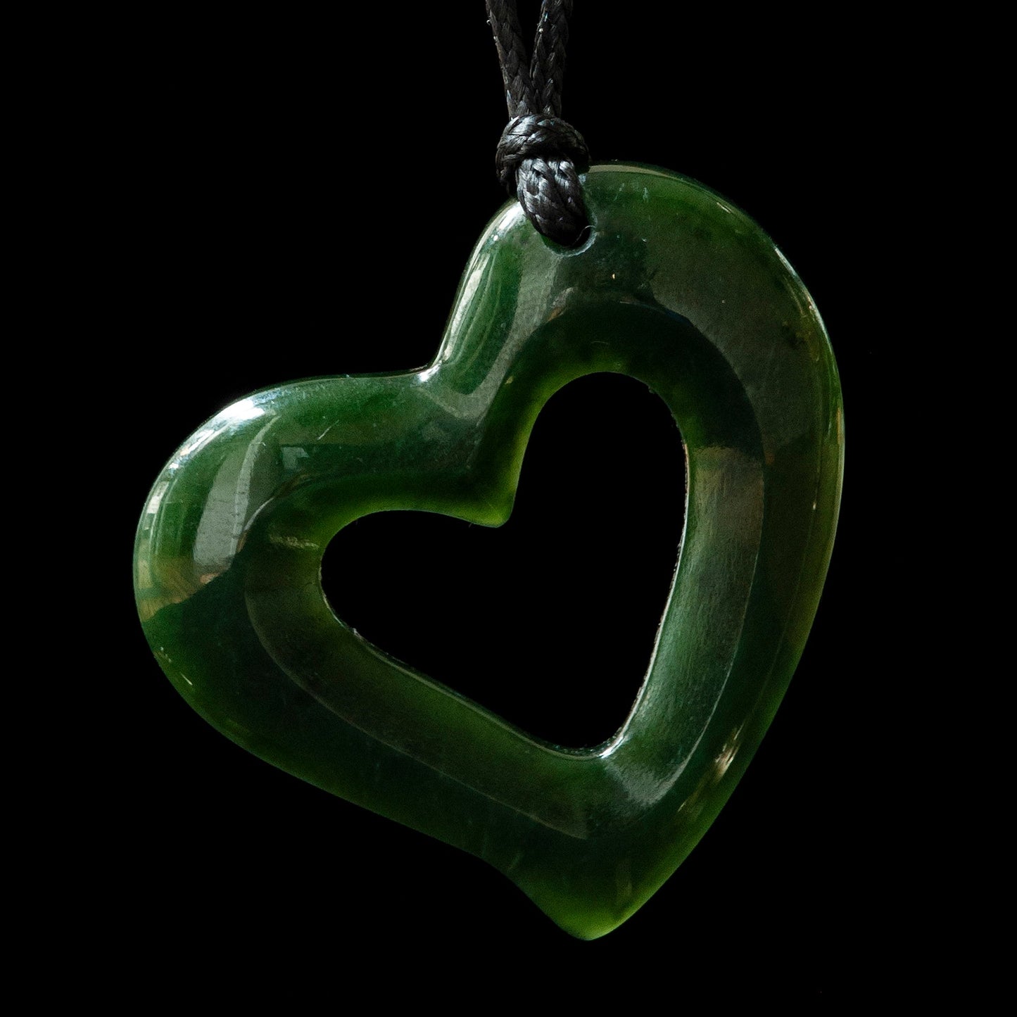 Pounamu Heart Pendant Hanging from Right