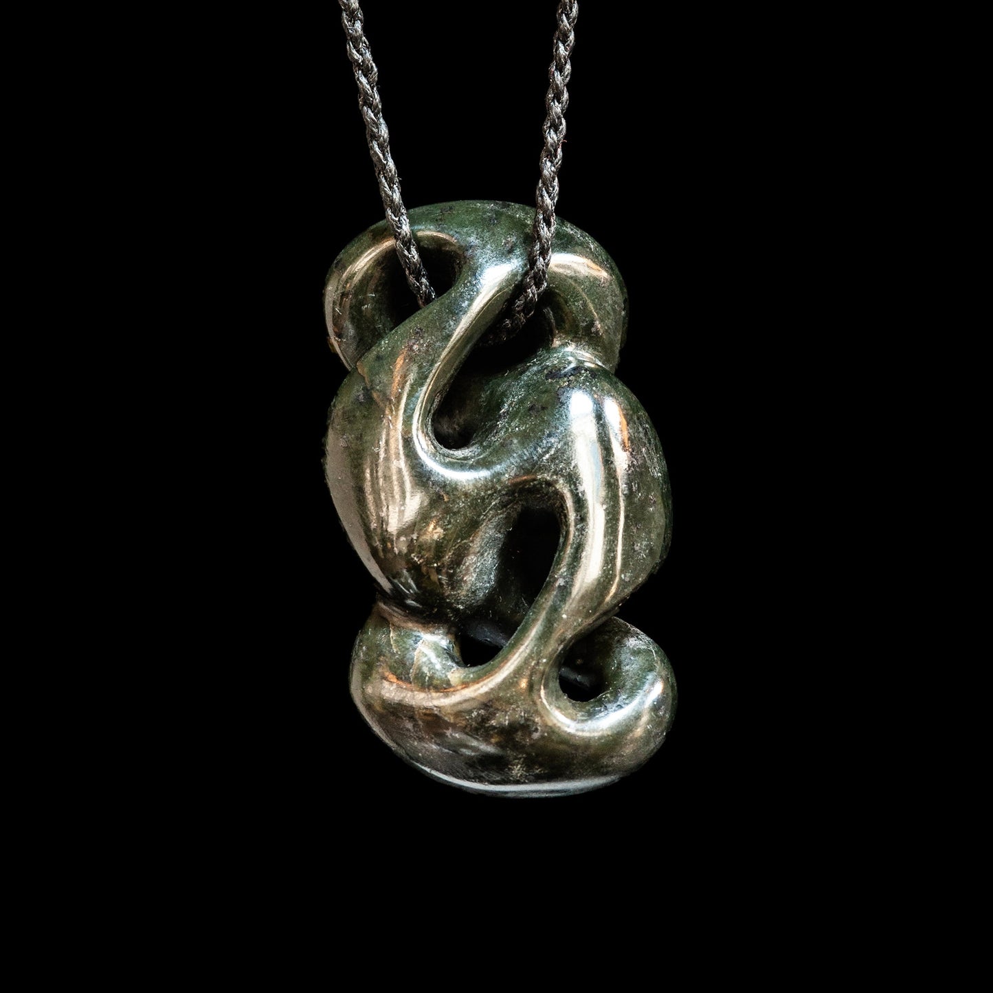 Onewa Pendant handcarved by Alex Sands
