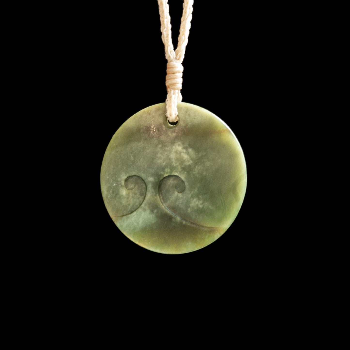 Jade disc pendant with korus by Nick and Mady Necklace