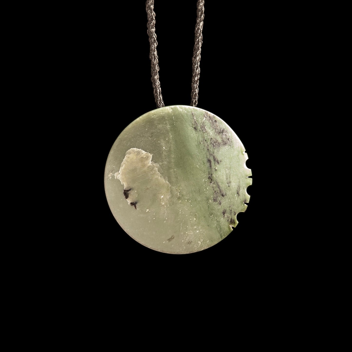 Jade disc pendant with korus by Madelyne Gourdin Necklace
