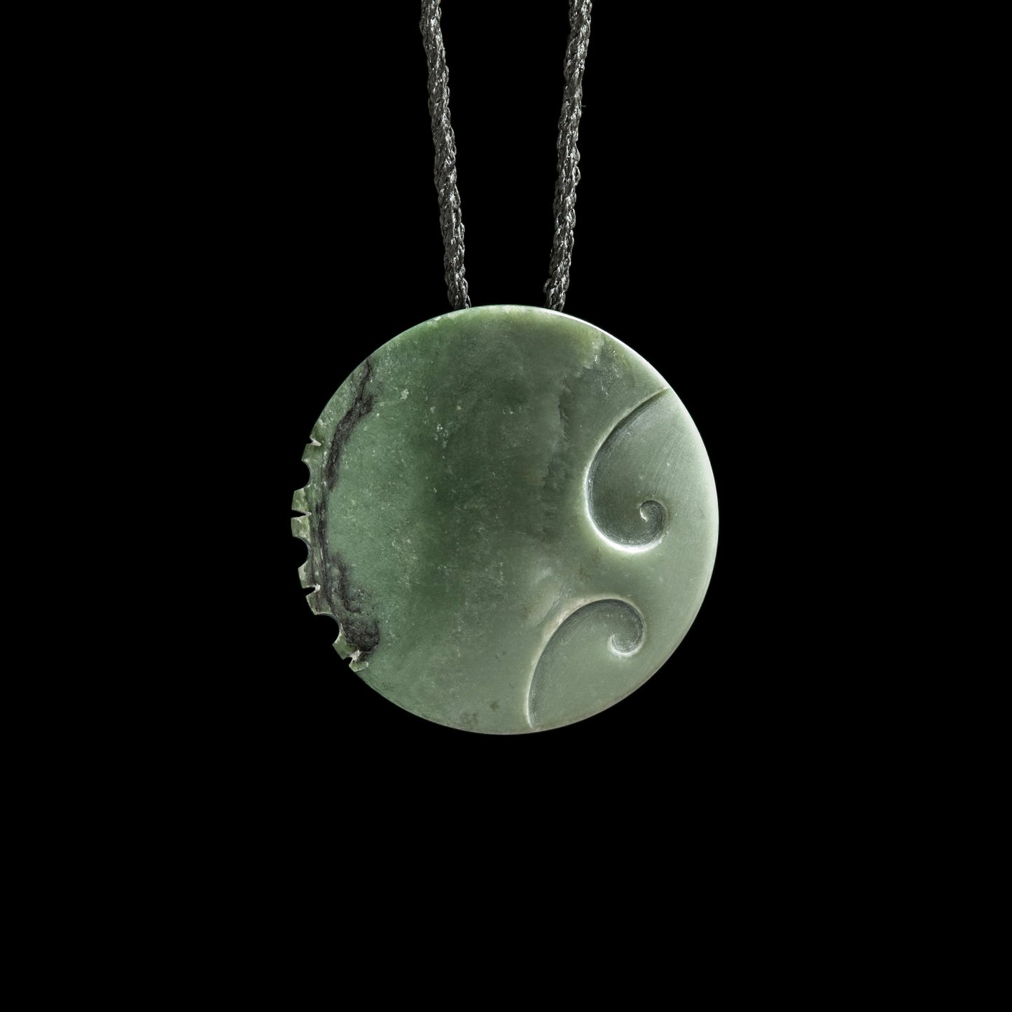 Jade disc pendant with korus by Madelyne Gourdin Necklace