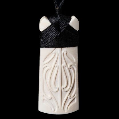 Engraved and Bound Toki Bone Pendant