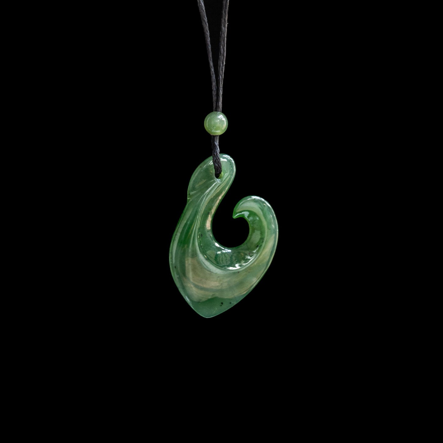 tiny Hei Matau - Hook, handcrafted jade pendant