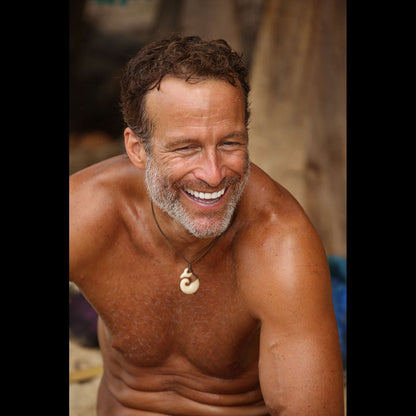 Bound Brosnan Koru, handcrafted bone pendant