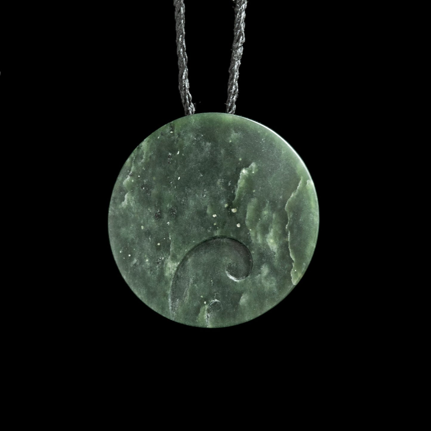 Jade disc pendant with korus by Nick and Mady Necklace