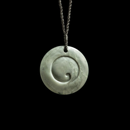 Jade disc pendant with korus by Nick and Mady Necklace